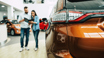 consumers at a dealership